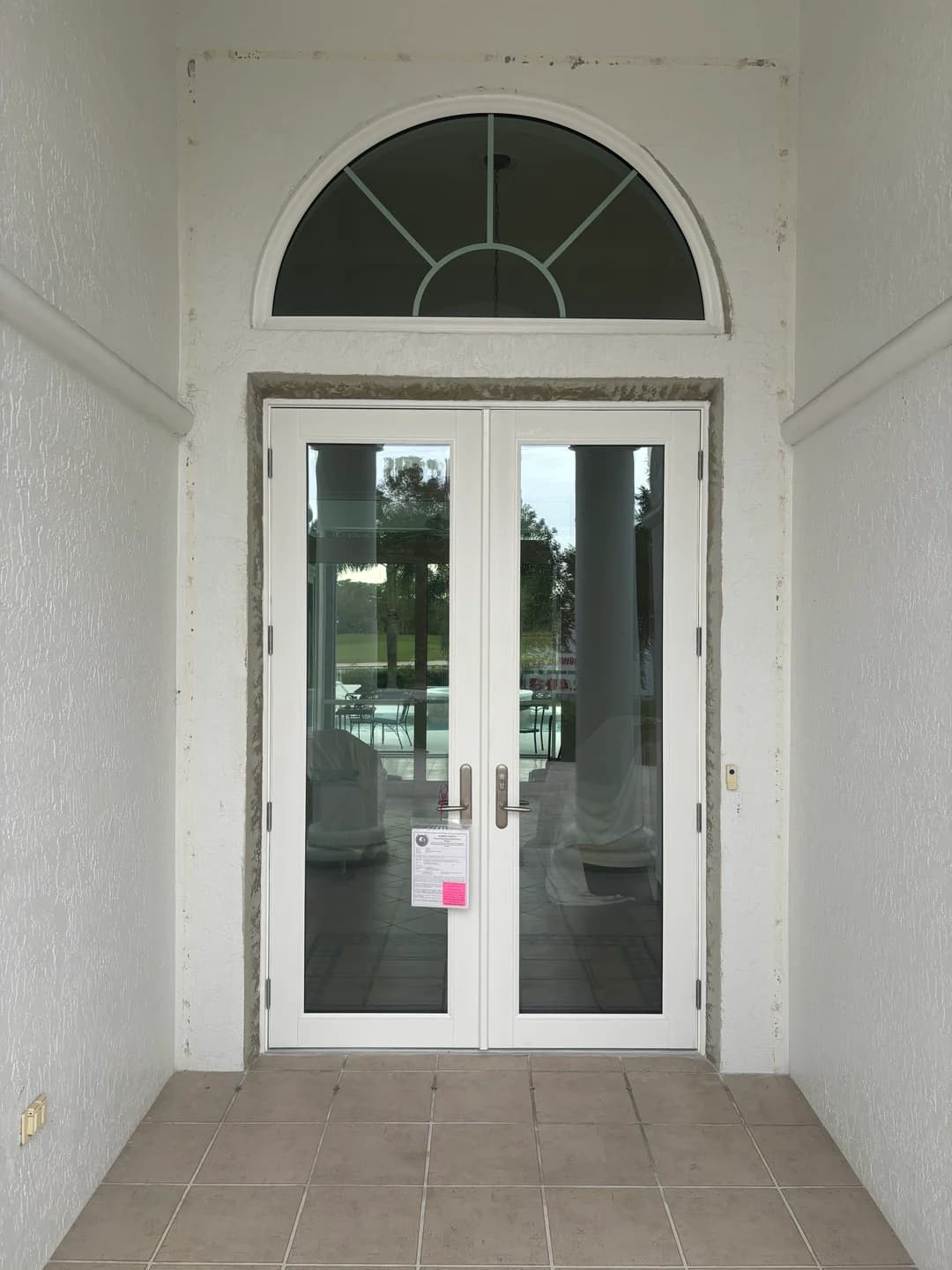 Completed impact door installation in Jensen Beach