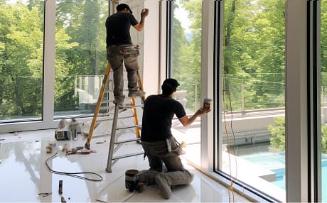 Impact-rated glass doors opening to a Florida patio
